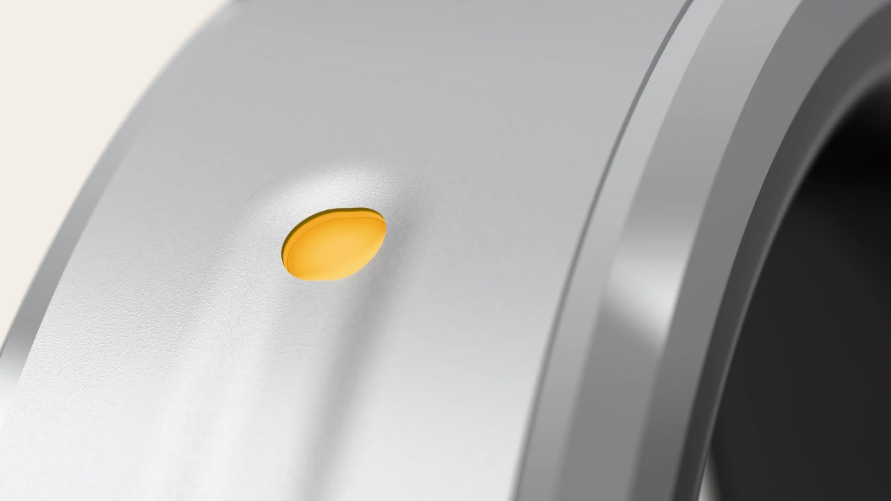 the amber light in its pill, close up.
